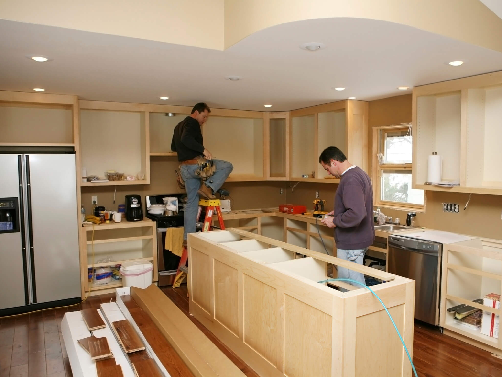 New Mexico home with contractors renovating kitchen